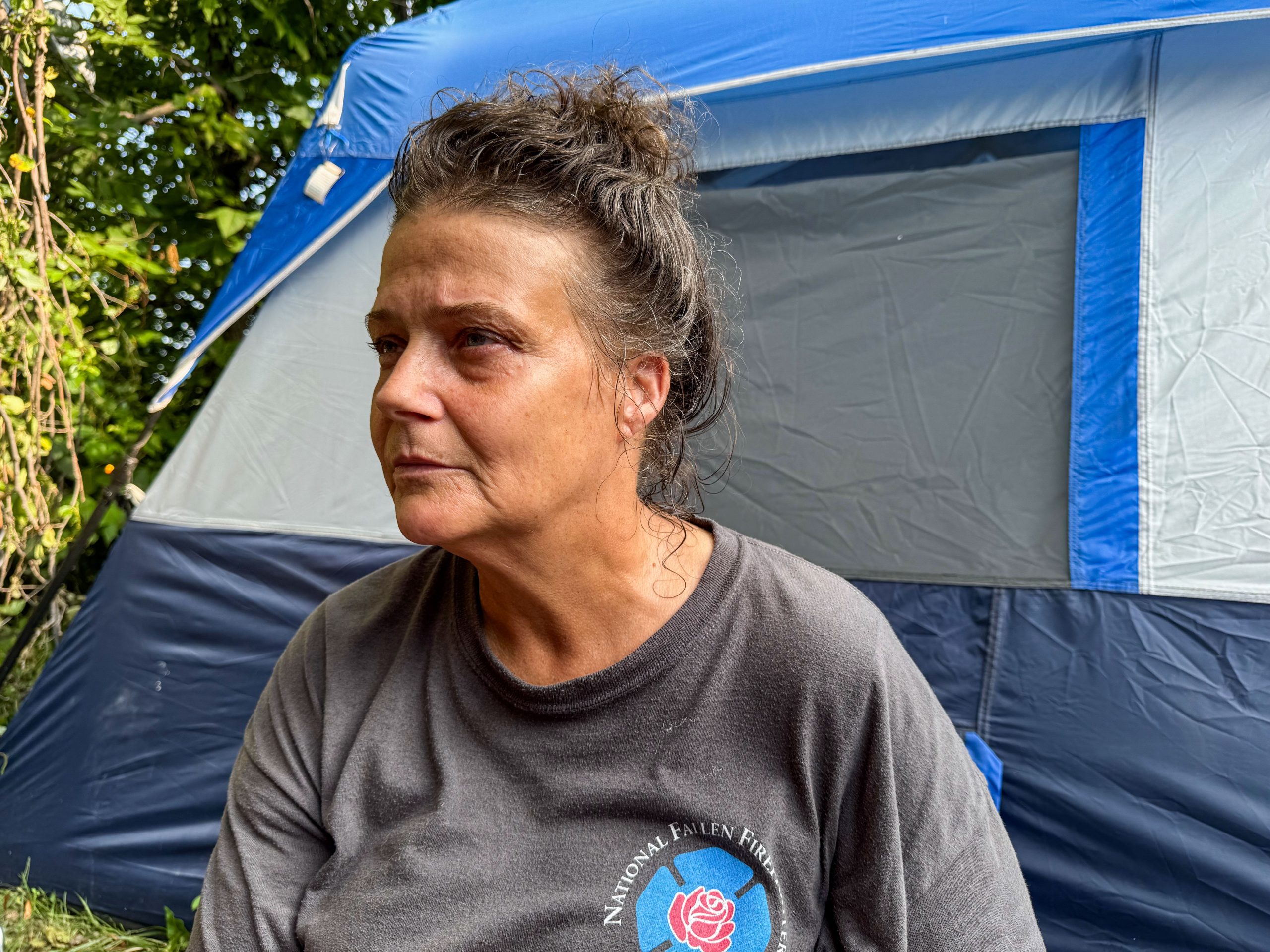 Indianapolis homeless encampment residents protecting image
