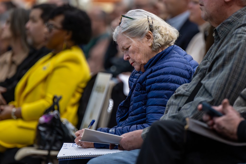 Judy Brown Fletcher makes notes as Community members gathered, February 10, 2026, at New Augusta Public Academy, to discuss their concerns about the impact Lebanon’s LEAP project will have on water leaving and returning to the Eagle Creek Reservoir.