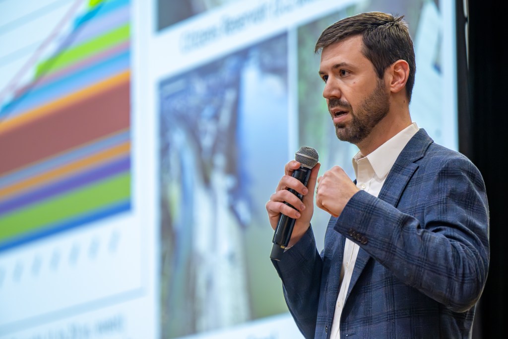 Steve Berube, Citizens Energy Group director of water production, addresses community members gathered Feb. 10, 2026, in the auditorium at New Augusta Public Academy to discuss concerns about the impact of Lebanon’s LEAP project on water leaving and returning to the Eagle Creek Reservoir.
