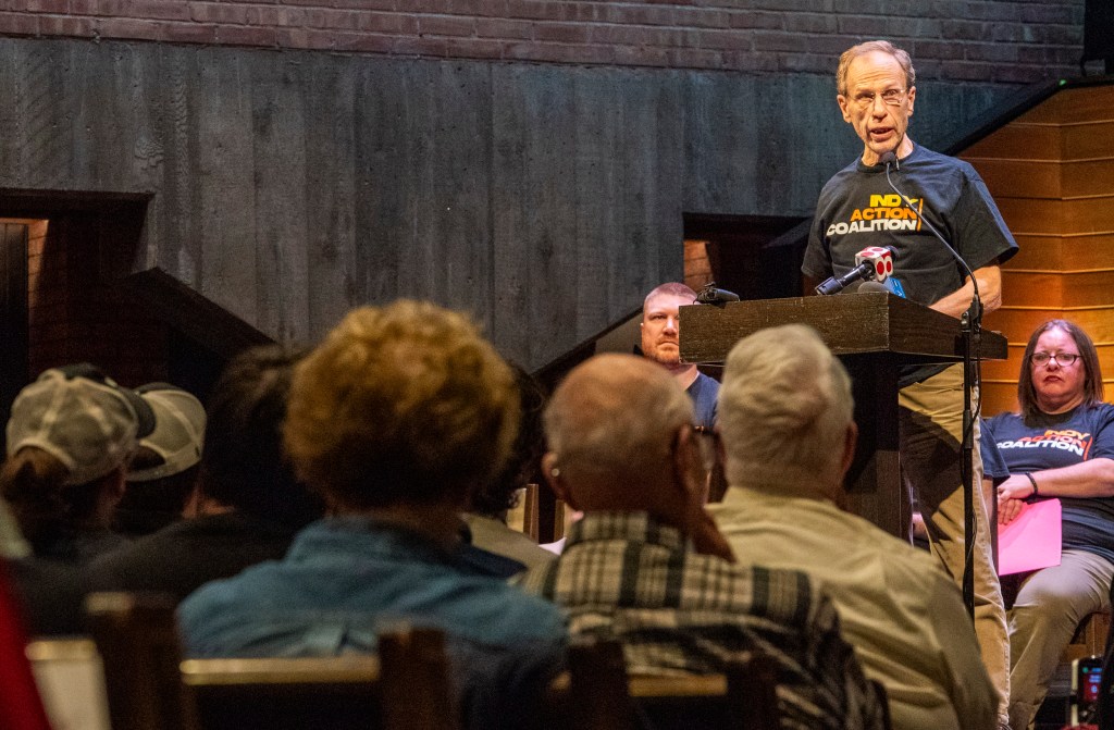 Scott Severns, a member of the Central Committee Research with Indy Action Coalition, speaks during the coalition’s public action meeting on March 12, 2026, at St. Luke’s United Methodist Church in Indianapolis.