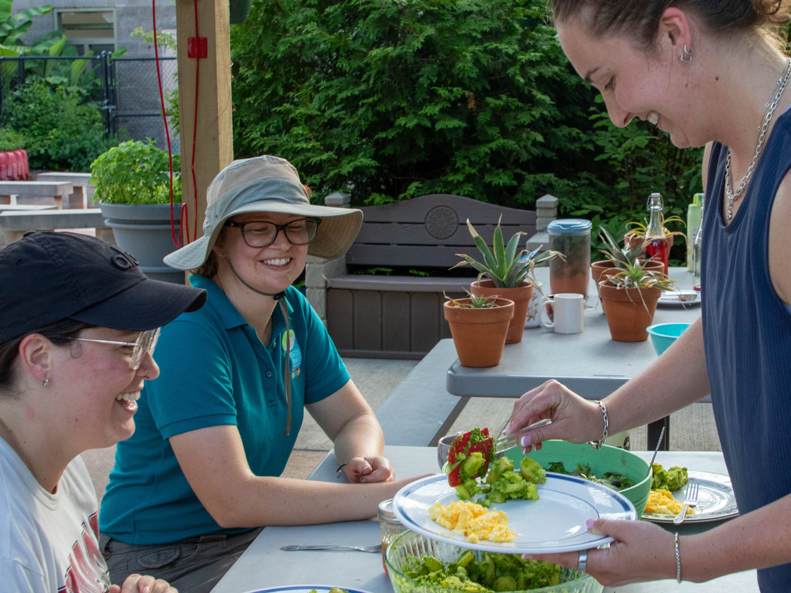 Reap food, new friendships at Garfield Park’s $1 community dinner